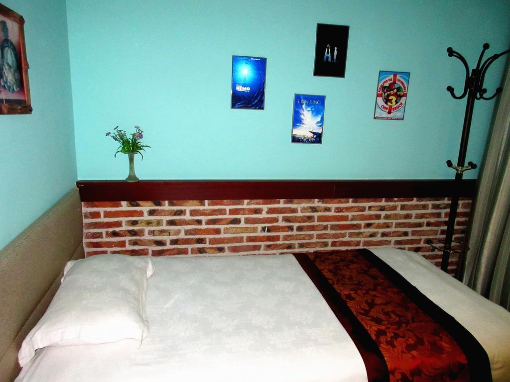 25°C Four Season Youth Hostel Ціндао Номер фото
