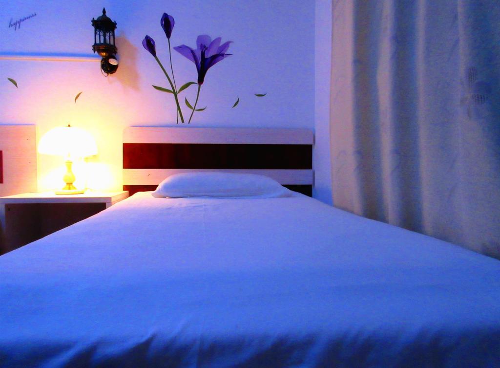25°C Four Season Youth Hostel Ціндао Номер фото