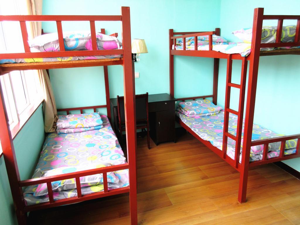 25°C Four Season Youth Hostel Ціндао Номер фото